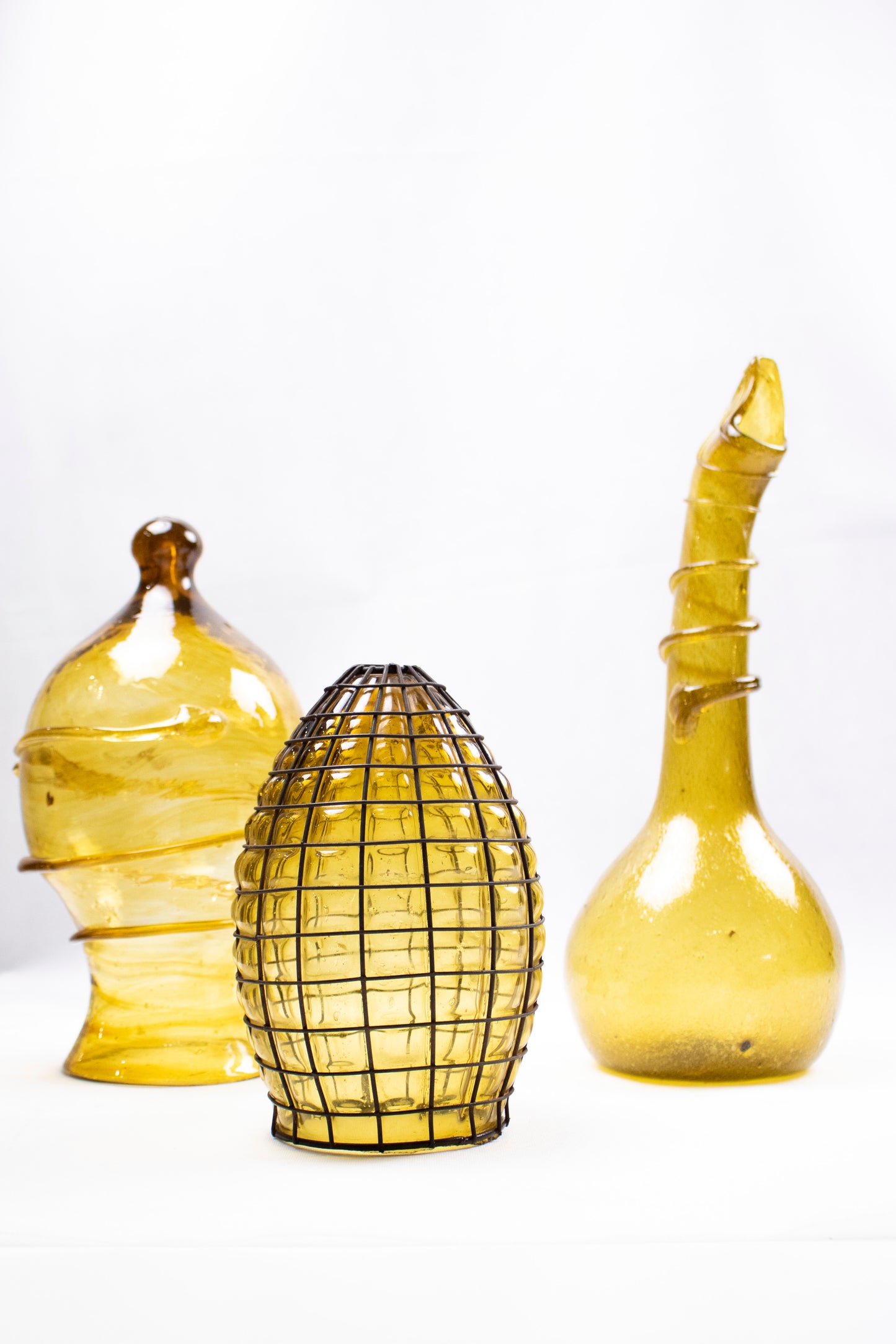 Hand-Blown Glass Vessel – Caged Sculptural Form