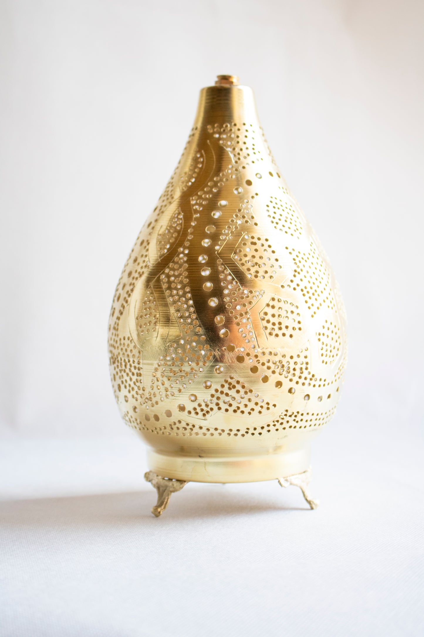 Handcrafted Metal Lantern with Perforated Design – Gold Finish